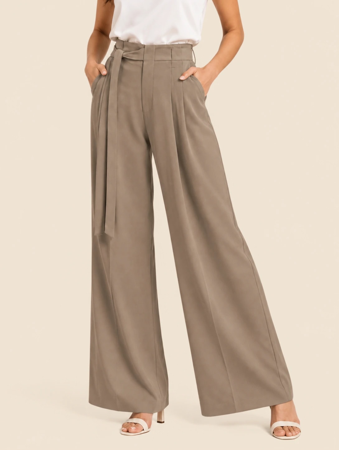 Model in the beige Milano tie up trousers